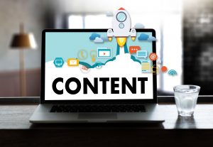 Imagem de um computador com a palavra conteúdo para remeter a matéria de marketing de conteúdo para o seu escritório contábil