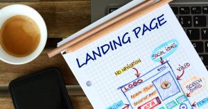 Imagem de um caderno que contém a palavra landing page para inspirar o empreendedor que deseja implementar a landing page na estratégia de marketing da sua empresa